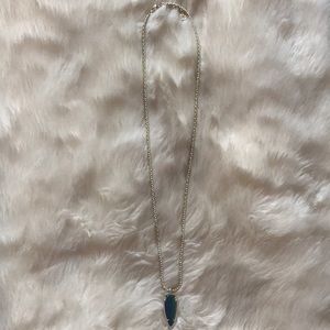 Kendra Scott necklace.